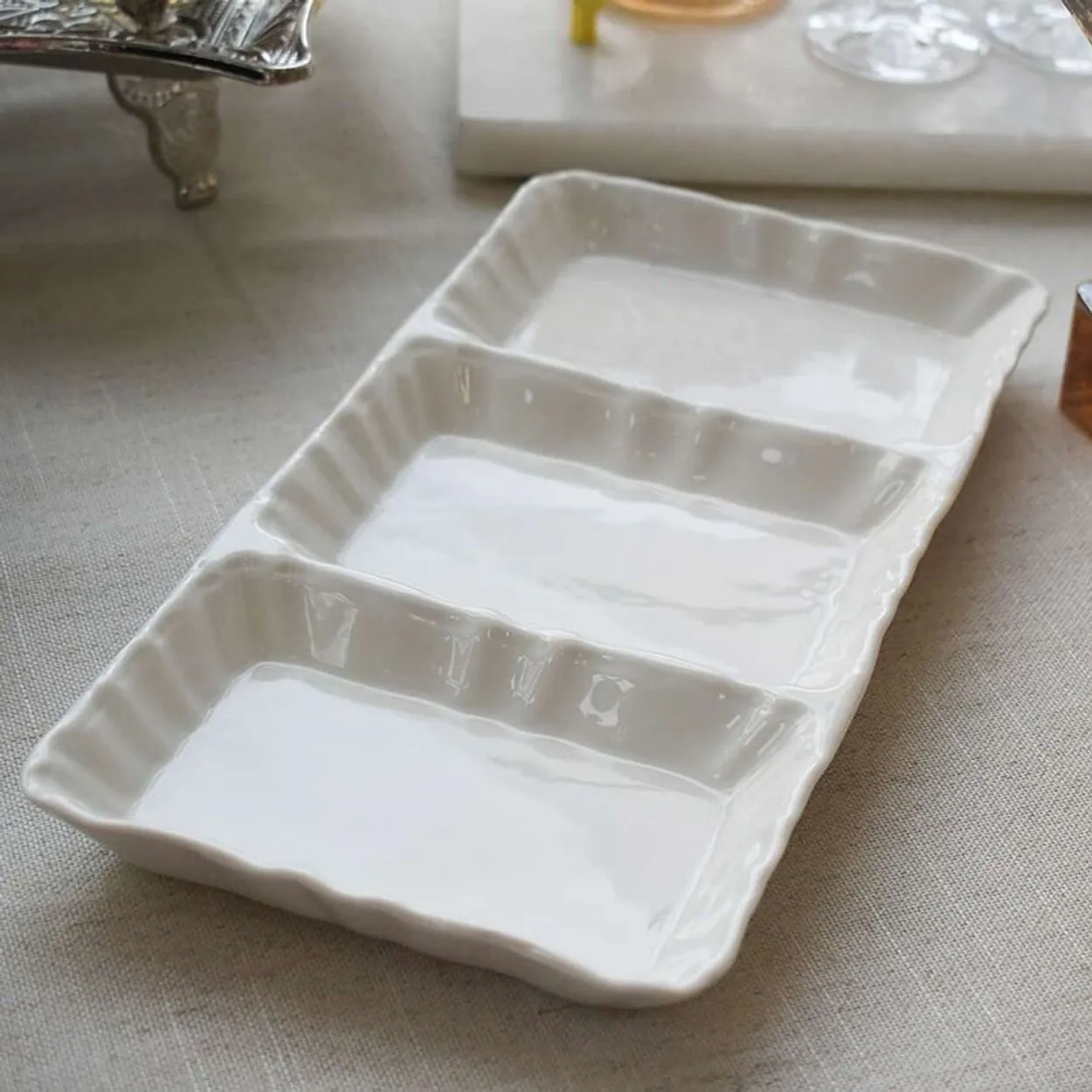 Conjunto de travessas e petisqueira